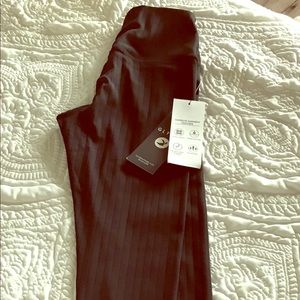 Glyder black leggings with vertical stripe detail